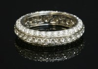 Lot 459 - A white gold diamond set band ring