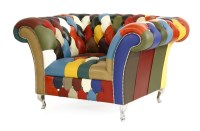 Lot 1201 - A contemporary patchwork leather armchair