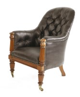 Lot 1033 - A mahogany and black leather armchair