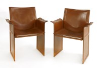 Lot 626 - A pair of Korium armchairs