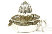 Lot 398 - A silver plated lemon squeezer