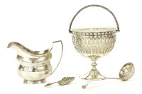 Lot 414 - A George III silver helmet shaped cream jug