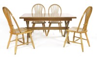 Lot 1015 - An 'X' frame oak table