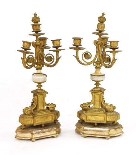 Lot 767 - A pair of Victorian gilt and onyx candelabra