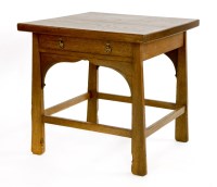Lot 100 - An Arts and Crafts oak centre table