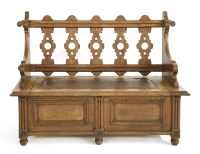 Lot 97 - An Arts and Crafts oak hall settle