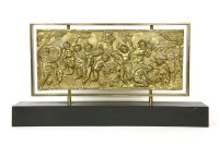Lot 775 - A gilt metal relief panel