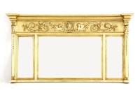 Lot 1152 - An Empire design gilt over mantel mirror
