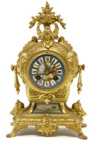 Lot 628 - A French gilt metal mantel clock