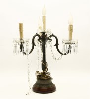 Lot 794 - A bronzed three branch four light candelabra