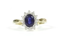 Lot 236 - A 9ct gold sapphire and diamond oval cluster ring