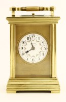 Lot 436 - A repeating brass carriage clock