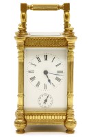 Lot 439 - A late 19th/early 20th century French brass carriage clock