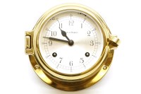 Lot 446 - A Kelvin Hughes brass ships clock