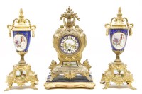 Lot 516 - A gilt spelter and porcelain clock garniture