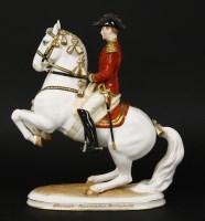 Lot 247 - A Vienna porcelain figure of a Spanish Riding School horse and rider