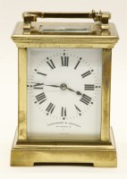 Lot 159 - A Shepheard and Co brass carriage clock