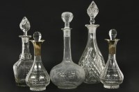 Lot 691 - A pair of Mappin and Webb silver collared decanters