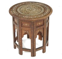 Lot 1008 - An Islamic circular table