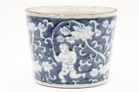 Lot 772 - An Oriental blue and white jardinière decorated with boys amongst foliage