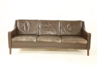 Lot 667 - A Danish leather three-seater settee