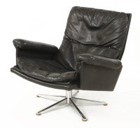 Lot 520 - A Danish black leather lounge chair
