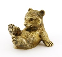 Lot 443 - A silver gilt bear cub paperweight