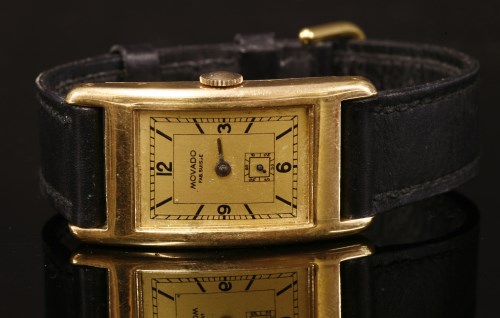 Lot 524 - A gentlemen's 18ct gold Movado mechanical strap watch