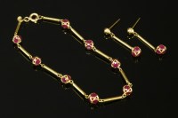 Lot 725 - A gold ruby bar link bracelet with matching drop earrings