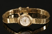 Lot 619 - A ladies' 9ct gold Accurist mechanical bracelet watch