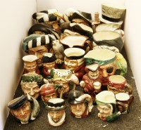 Lot 338 - A large collection of Toby jugs of varying sizes