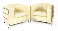 Lot 356 - A pair of cream leather tub chairs