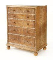 Lot 212 - An oak chest of five graduated drawers