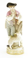 Lot 530A - A Meissen shepherd with lamb and bird