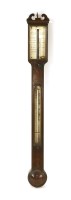 Lot 892 - An antique stick barometer with ebony banding to the case