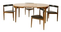 Lot 497 - A teak dining table