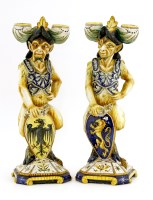 Lot 37 - Two Cantagalli maiolica pottery candlesticks