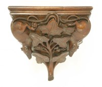 Lot 54 - A carved walnut wall bracket