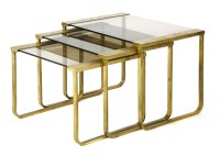 Lot 259 - A set of three brass tables