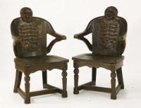 Lot 710 - A pair of unusual Continental oak armchairs
