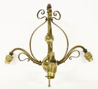 Lot 386 - An Arts and Crafts brass three branch electrolier