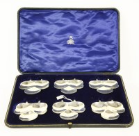 Lot 126 - A cased set of six silver clover leaf dishes