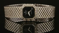 Lot 284 - A ladies' 18ct white gold diamond set Montre Royale quartz bracelet watch