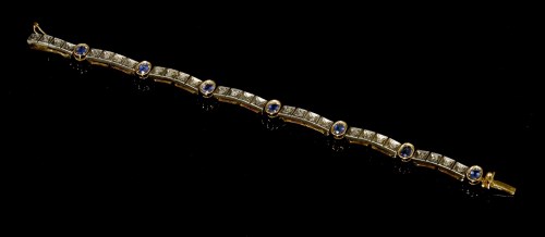 Lot 188 - A Continental silver and gold sapphire and diamond line bracelet