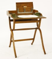 Lot 680 - A late 19th century oak folding campaign desk