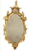Lot 1052 - A Chippendale period carved giltwood wall mirror