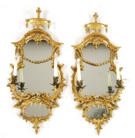 Lot 1053 - A pair of Chippendale period carved giltwood girandoles