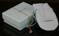 Lot 380 - A ladies' 18ct rose gold Tiffany diamond set 'Loving Heart' pendant