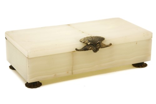 Lot 306 - An onyx and silver gilt mounted cigarette box
