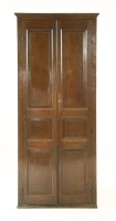 Lot 918 - A George III oak standing corner cabinet